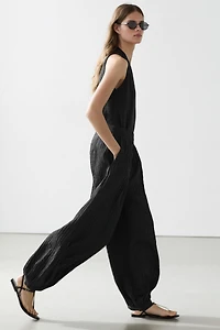 Flowing linen-blend drop crotch pants