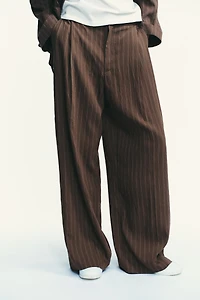 DOUBLE PLEAT FLAP PANTS
