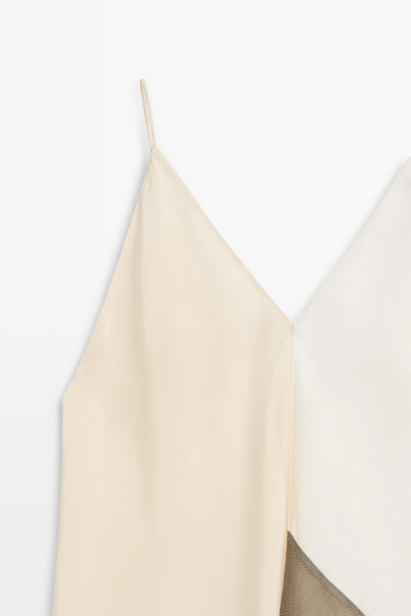 Asymmetric strappy flowing top
