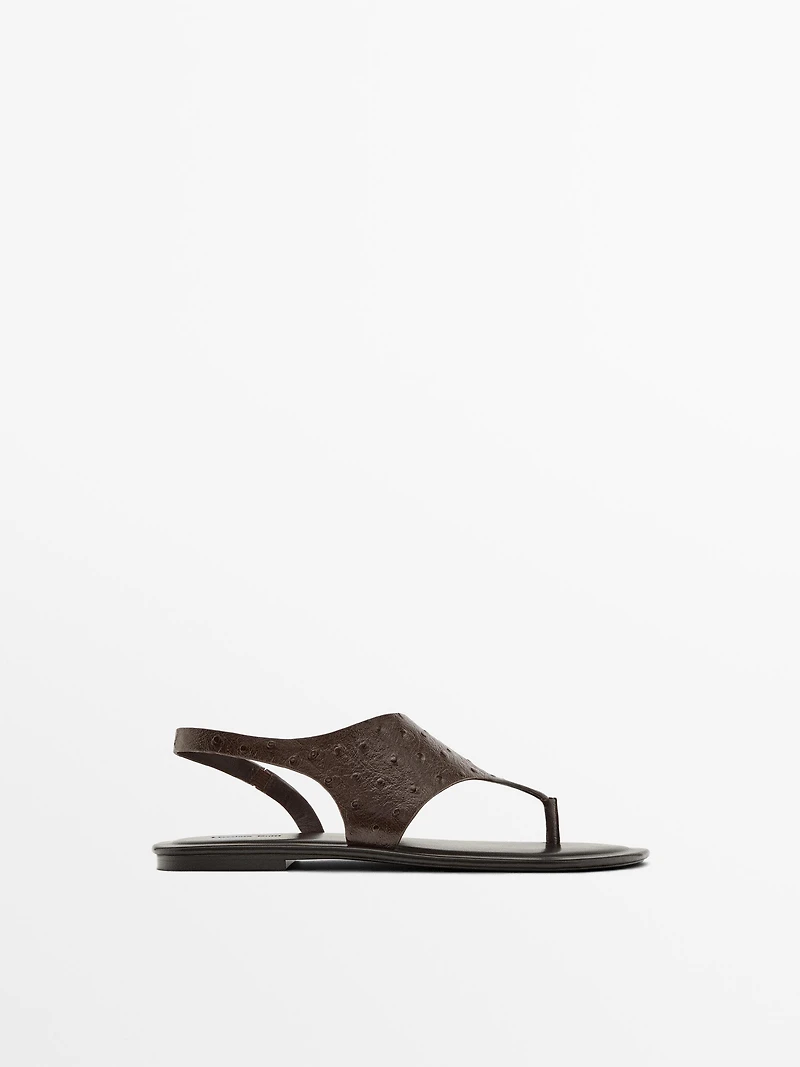 Embossed animal print sandals
