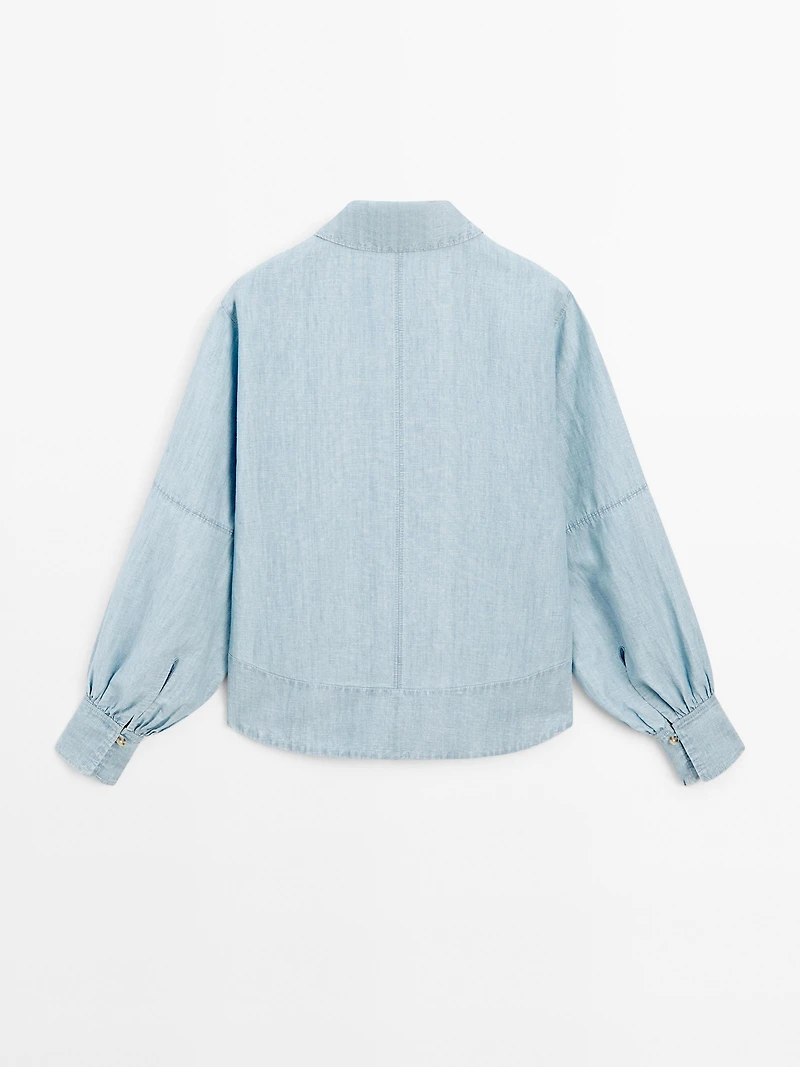 Oversize denim blouse with puff sleeves