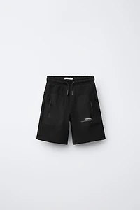 BERMUDA SPORT EN MATIÈRES VARIÉES