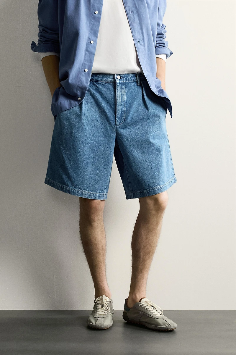 RELAXED FIT PLEATED DENIM CHINO SHORTS