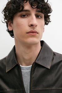 Distressed effect leather jacket