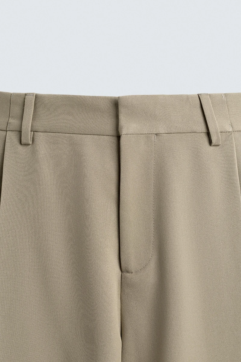 PANTALON COUPE LARGE À PLIS