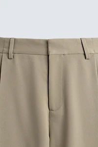 PANTALON COUPE LARGE À PLIS
