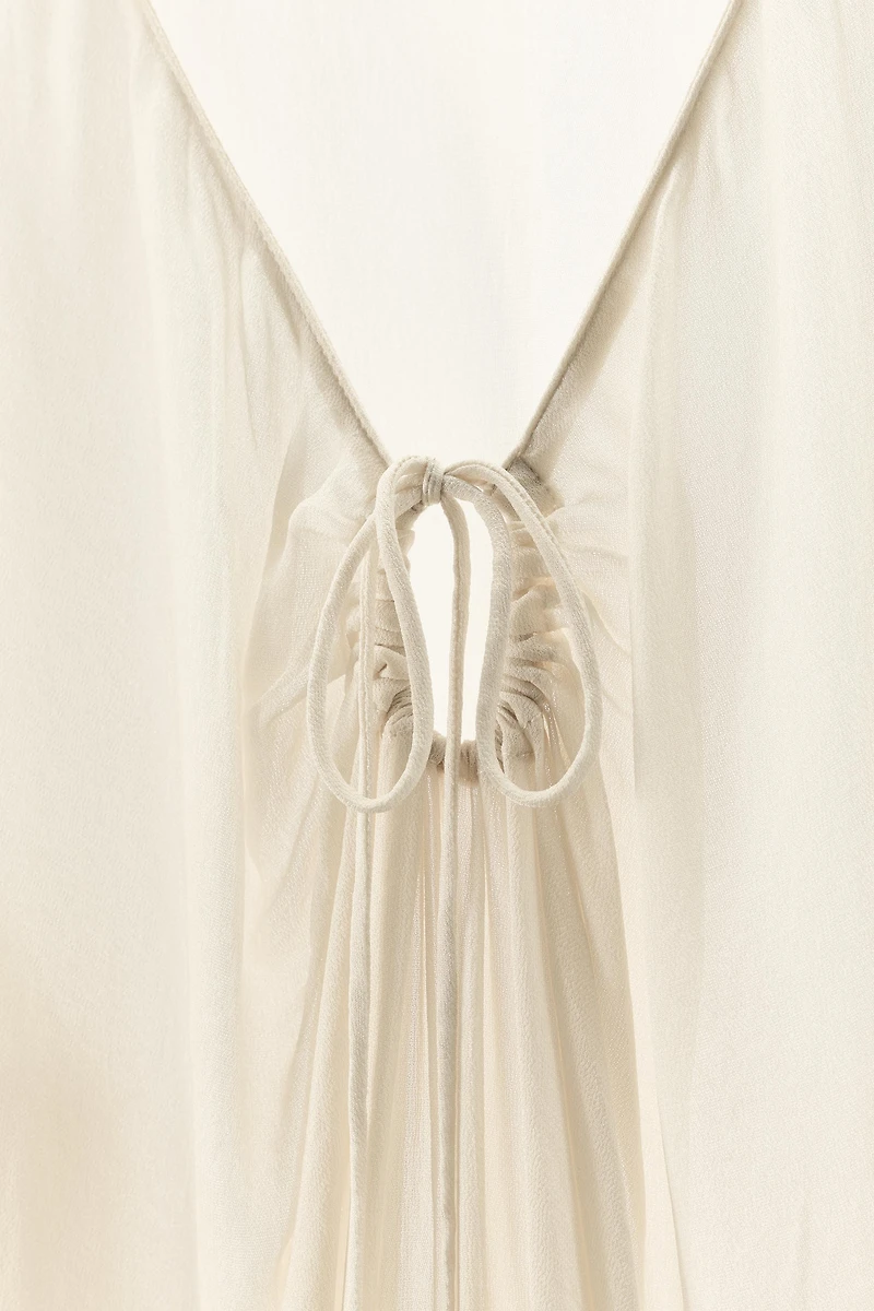 TOP SEMI-TRANSPARENT FLUIDE