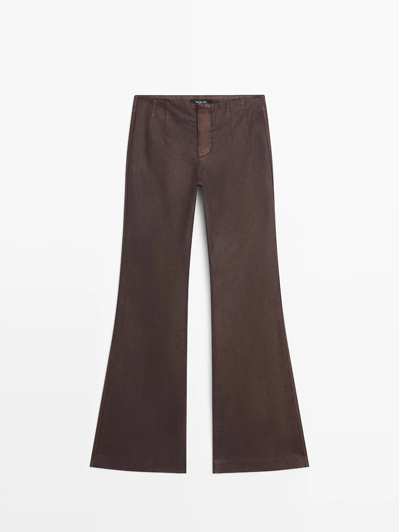 Waxed flare fit trousers