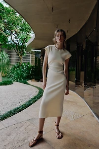 KNIT CUT OUT DRESS WITH BALLS