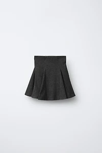 JUPE-SHORT EN MAILLE CÔTELÉE À VOLANTS