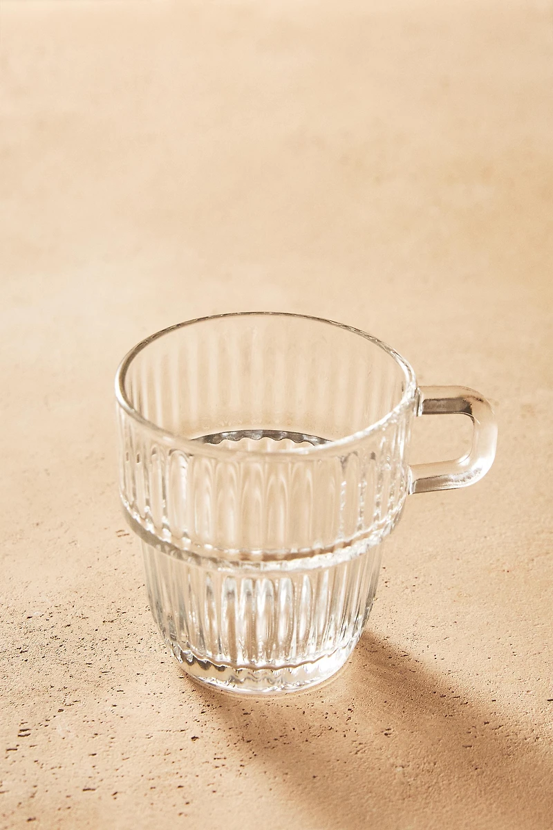 GLASS CUP WITH RAISED DESIGN