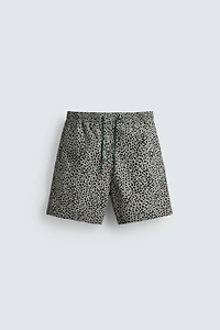 ANIMAL PRINT LONG SWIM TRUNKS