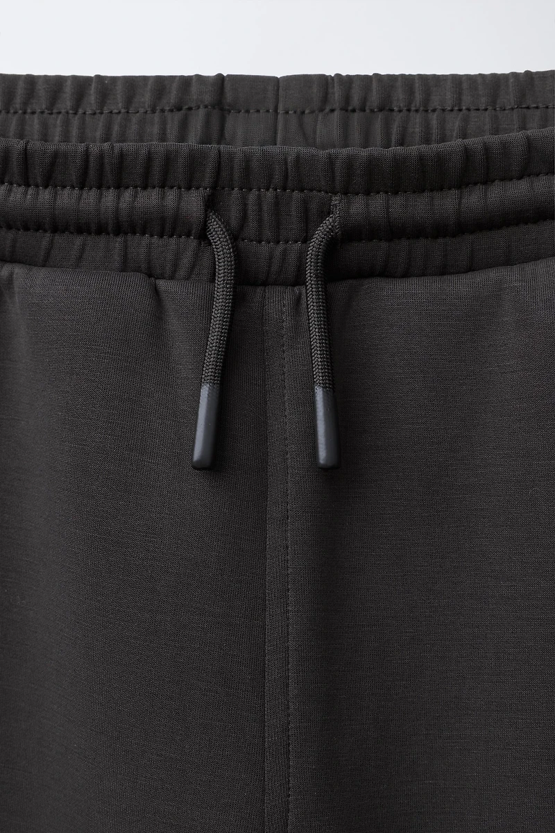 REFLECTIVE TEXT SPORTY JOGGER PANTS