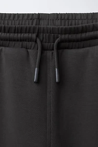 REFLECTIVE TEXT SPORTY JOGGER PANTS