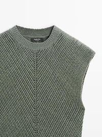 Sleeveless knit top with openwork details