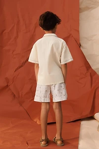 SHORT DE BAIN À CARREAUX ET FLEURS ÉDITION LIMITÉE