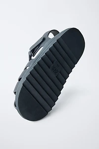 RUBBERIZED CAGE SANDALS