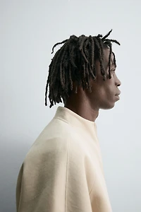 CROPPED FIT NEOPRENE EFFECT SWEATSHIRT WITH STUDS