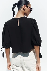 BLOUSE BRODÉE À MANCHES BOUFFANTES