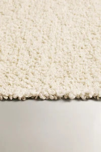 BOUCLÉ WOOL AREA RUG