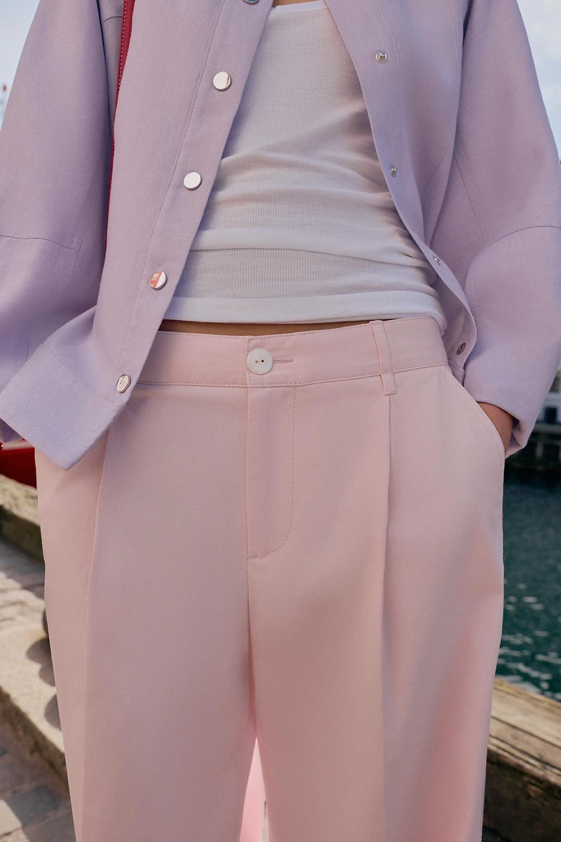 PLEATED CHINO PANTS