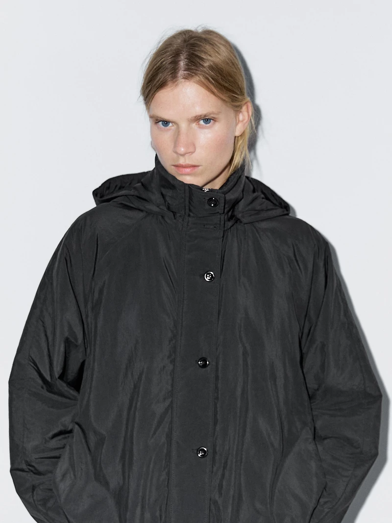 Water-repellent padded parka with high neck