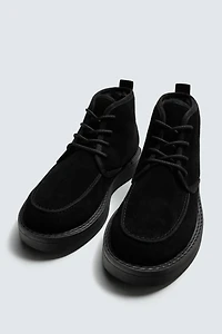 BOTTES EN CUIR À LACETS