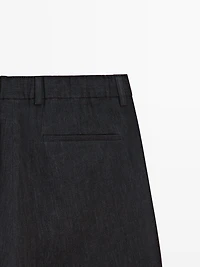 Total look linen trousers with flecked detail