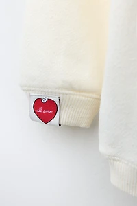 SNOOPY PEANUTS™ TERRY PATCH SWEATSHIRT