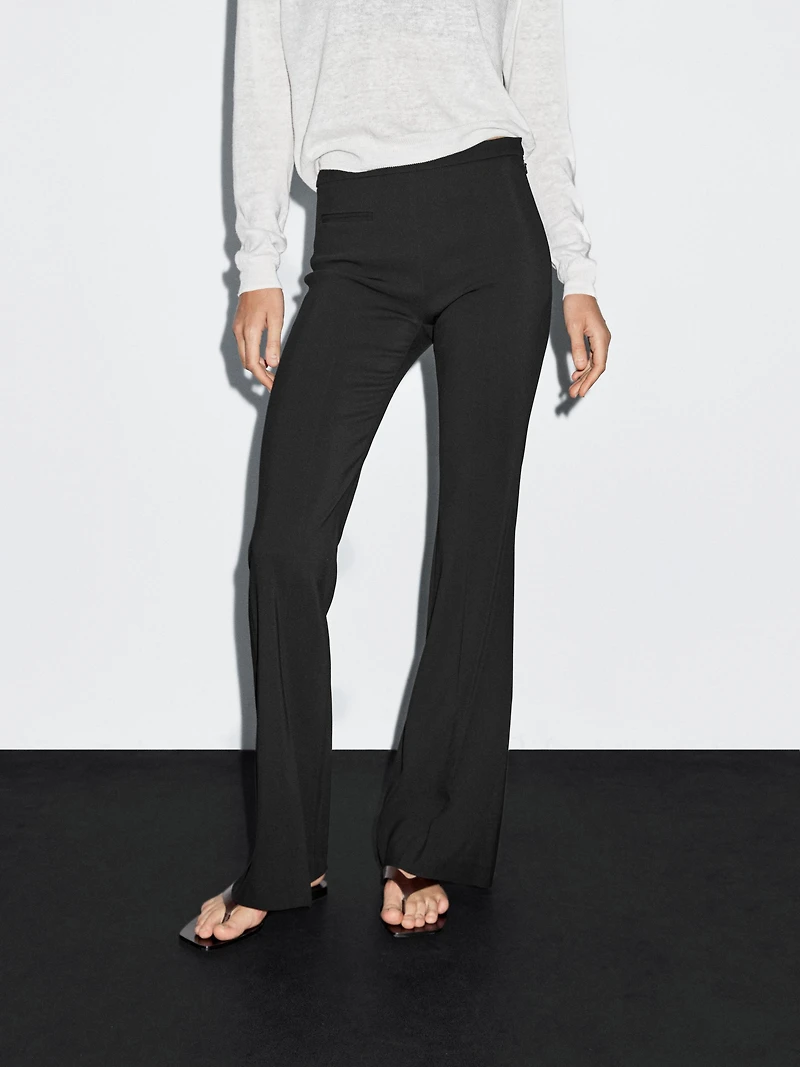 Flared trousers with pocket