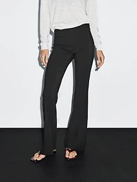 Flared trousers with pocket