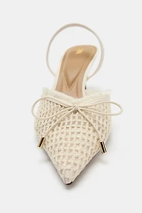 CHAUSSURES OUVERTES À L'ARRIÈRE AVEC NŒUD