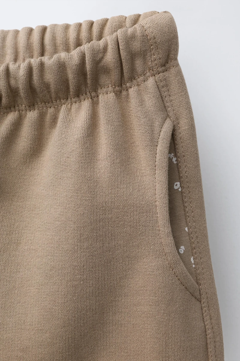 PRINTED POCKET PLUSH PANTS