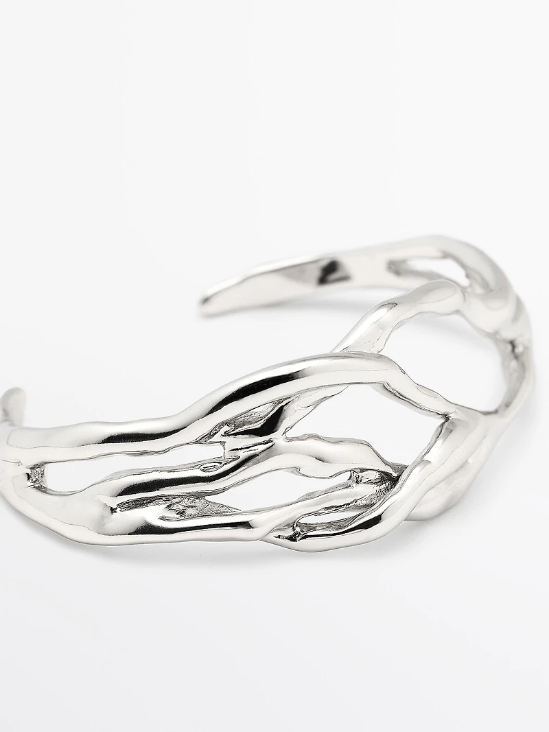 Bracelet métallique abstrait