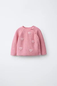 PULL EN MAILLE À PAPILLONS