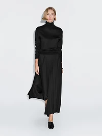 Asymmetric box pleat skirt
