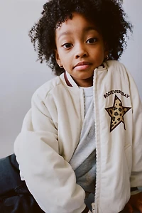 ANIMAL PRINT PATCH BOMBER JACKET