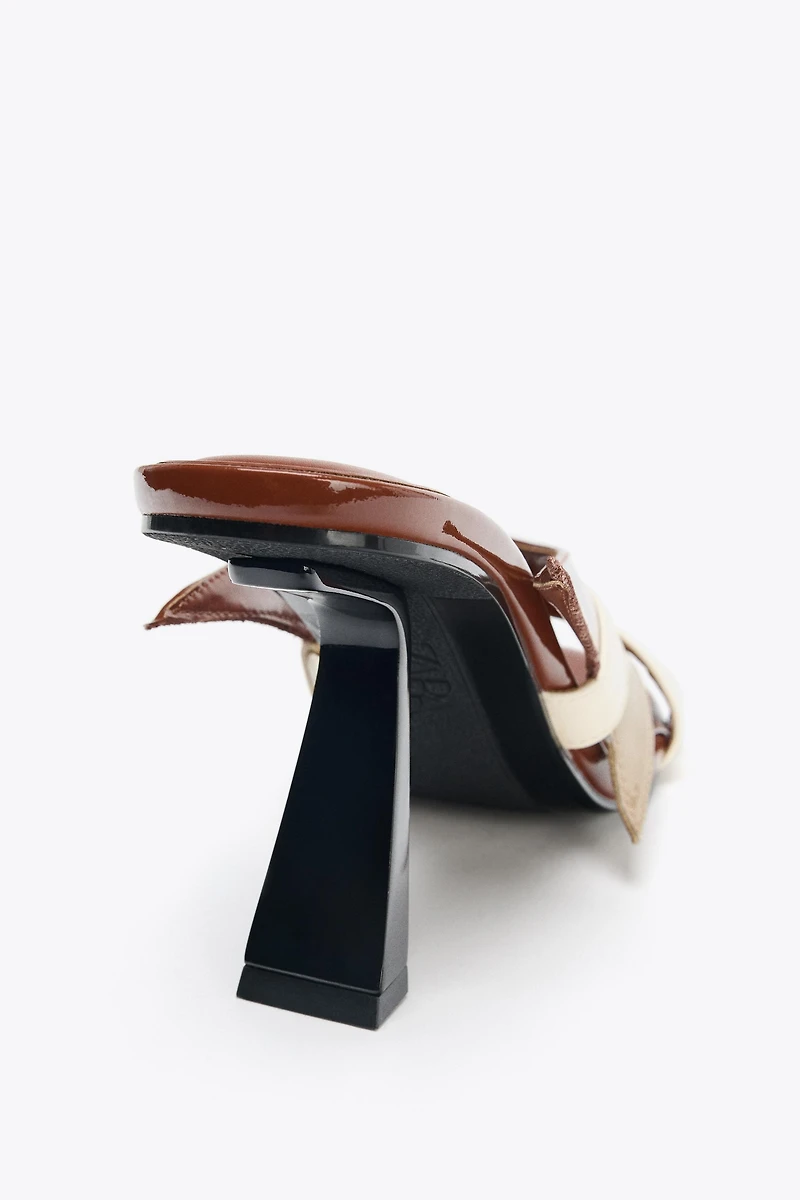 ASYMMETRIC HEELED SANDALS
