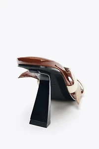 ASYMMETRIC HEELED SANDALS