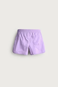 MID-LENGTH SWIMSUIT WITH VENTS