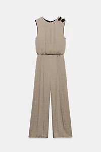SATIN JUMPSUIT WITH SHOULDER FROG FASTENING