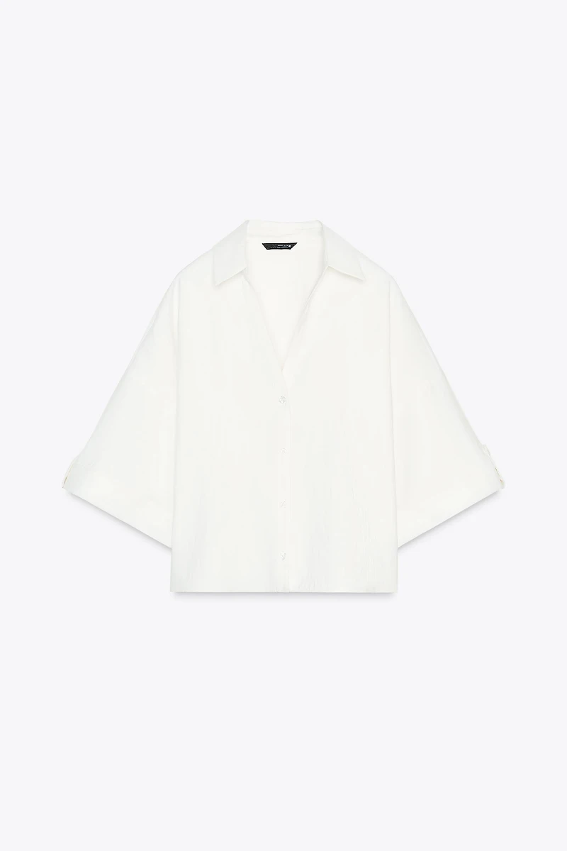 CHEMISE MANCHES COURTES LARGES