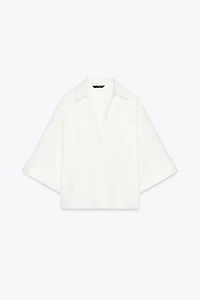 CHEMISE MANCHES COURTES LARGES