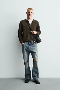 FLARE FIT RIPPED JEANS