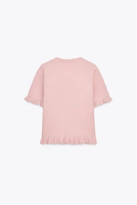 RUFFLED SHORT SLEEVE KNIT SWEATER
