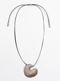 Necklace with fossil piece pendant