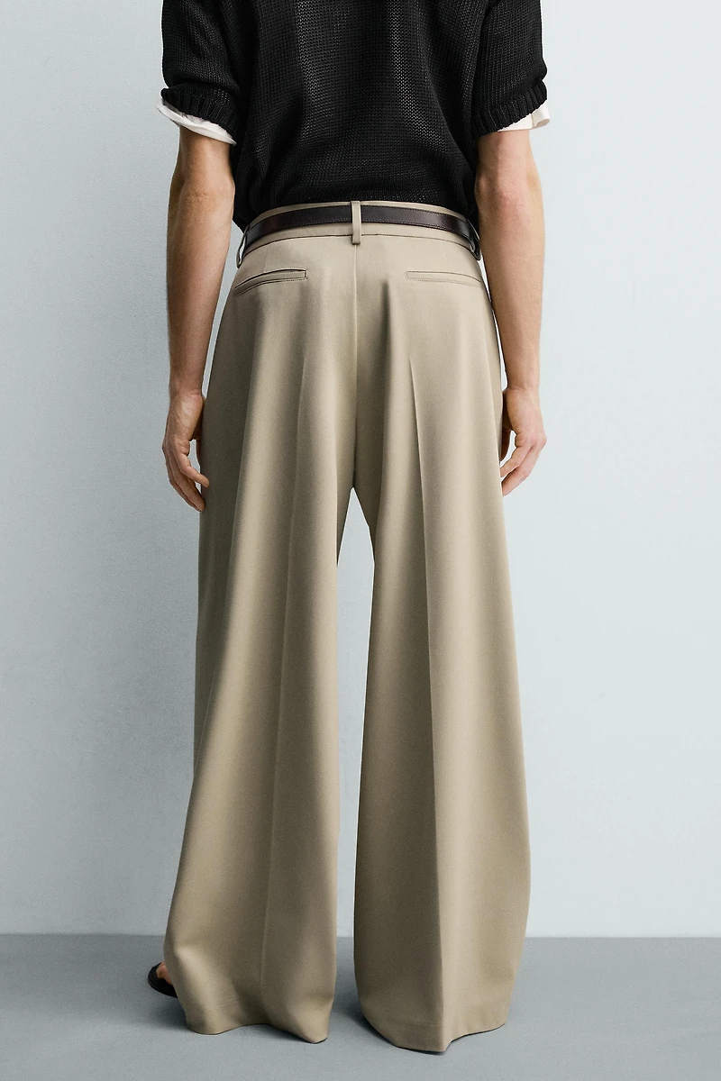 PANTALON COUPE LARGE À PLIS