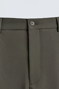 RELAXED FIT PLEATED PANTS