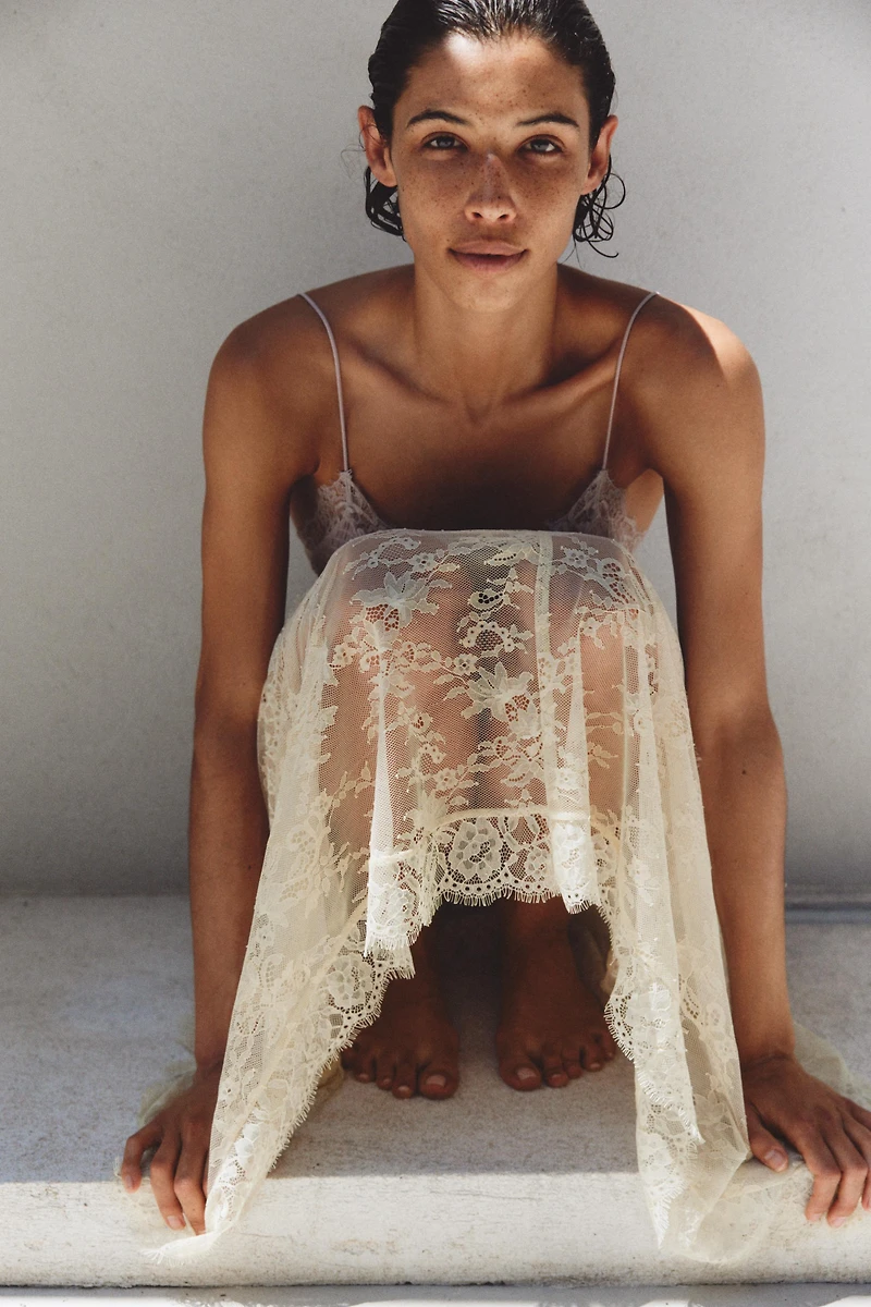 ASYMMETRIC LACE MIDI SKIRT