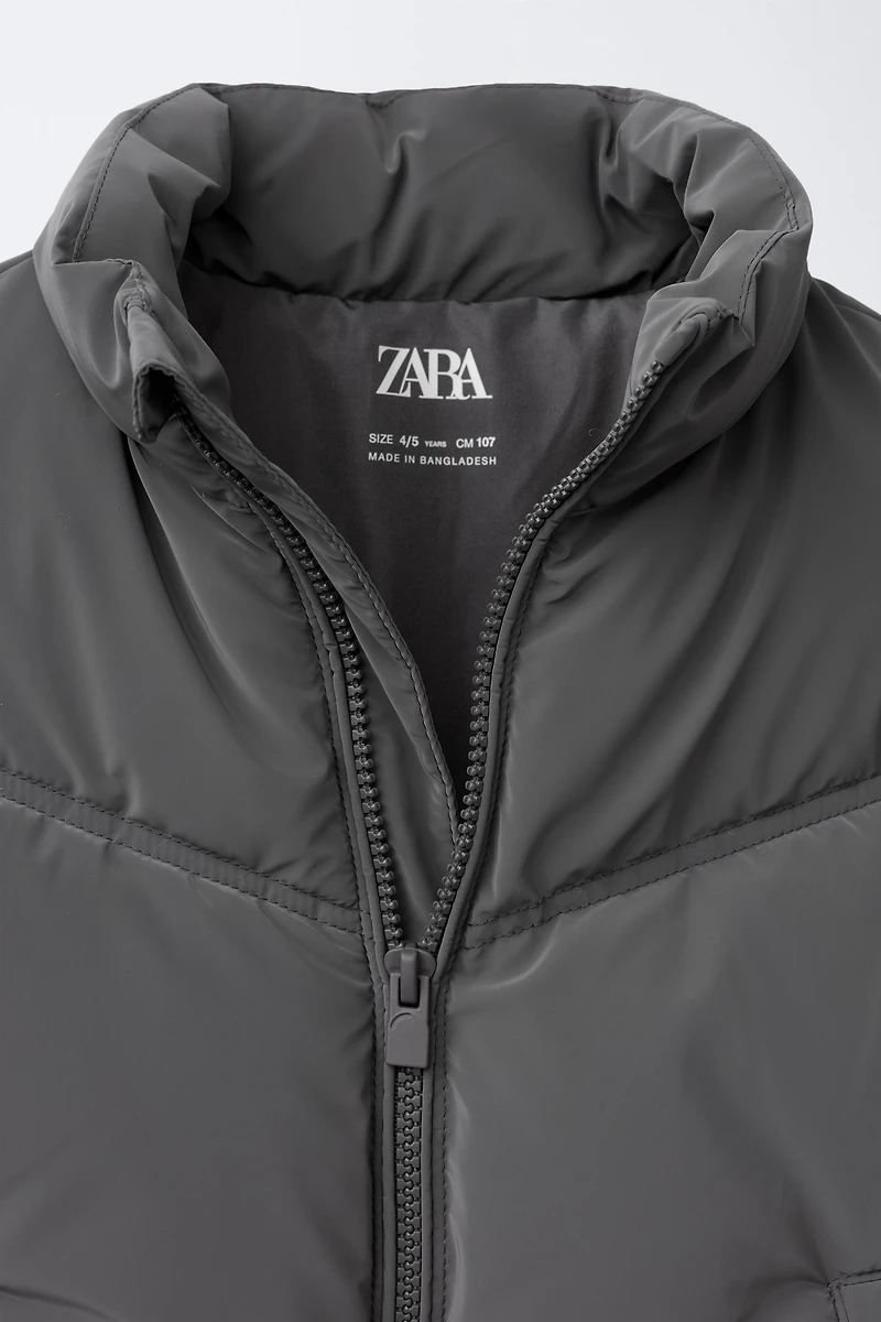 RUBBERIZED VEST